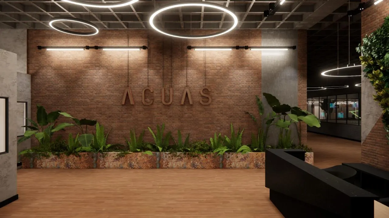 Projeto da nova Acuas Águas Claras: letreiro Acuas em painel de tijolos, jardim e iluminação em anéis